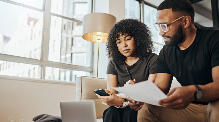 Man and woman read online reviews characterized as online defamation.