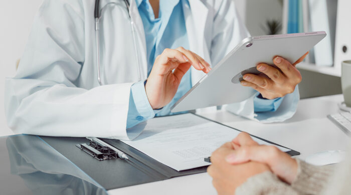 Medical professional maintains their online reputation management by monitoring and responding to reviews.