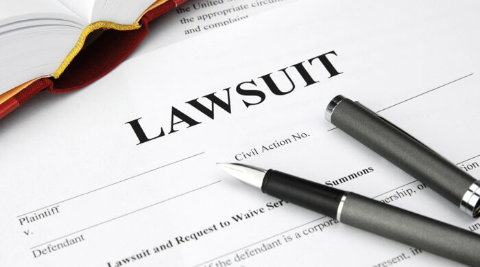 Black lawsuit document waiting to be filled out.